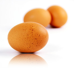 Three brown eggs