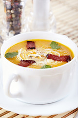 Pumpkin soup with smoked bacon