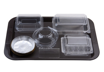Tray of empty bakery plastic package utensils for storage bread