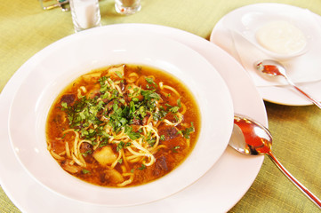 Soup with noodles and mushrooms