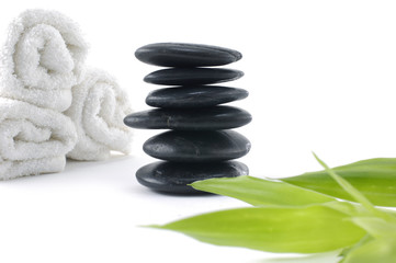 set for spa-*white towel ,stacked stone and bamboo leaf