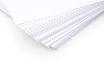 Stacked white paper on white background