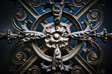 Beautiful, decorative antique flowers made of metal on a big cah