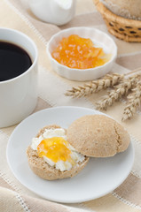 breakfast with muffin, cheese and jam