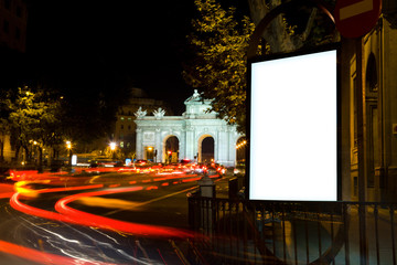 Blank Billboard in a City Night