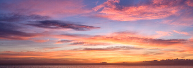 Fine orange and blue sunrise on the beach - obrazy, fototapety, plakaty