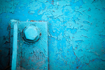 Old blue painted steel construction and bolt