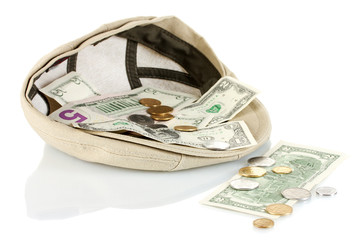 cap with money on a white background