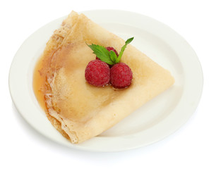 Delicious pancake with berries and honey