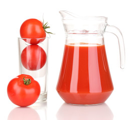Tomato juice in pitcher isolated on white