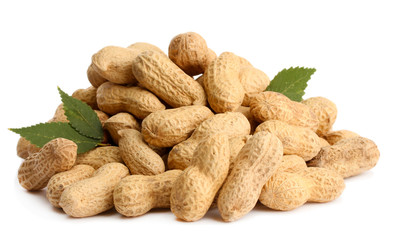 tasty peanuts with leaves, isolated on white