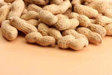 tasty peanuts, on beige background