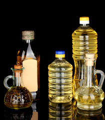 Olive and sunflower oil in the bottles and small decanters
