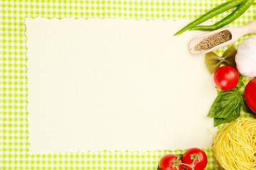paper for recipes,vegetables and spices on green background