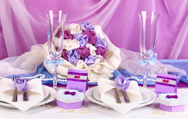 Serving fabulous wedding table in purple color