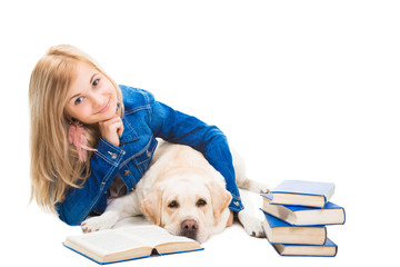 girl reading a book with Labrador retriever on isolated white