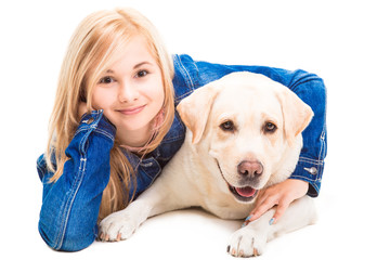 girl embracing Labrador retriever on the isolated white