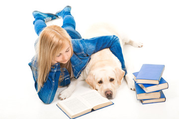 girl reading a book with Labrador retriever on isolated white