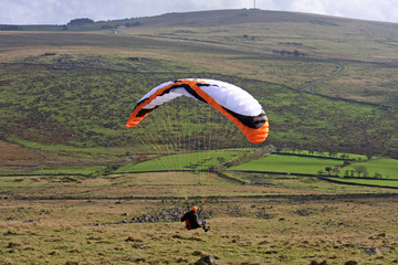 paraglider over dartmoor