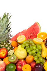 Huge group of fresh fruits isolated on a white