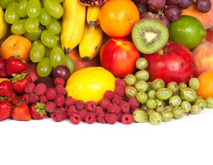 Huge group of fresh fruits isolated on a white background.
