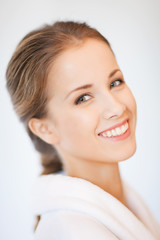 Naklejka premium beautiful woman in bathrobe
