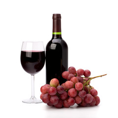 Obraz premium Full red wine glass goblet, bottle and grapes
