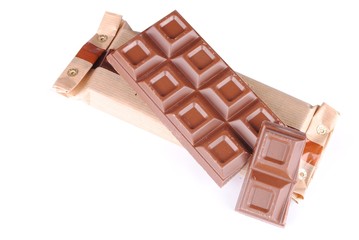 chocolate bar on a packet, on white background soft shadows