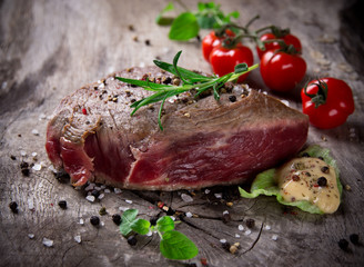 Medium Grilled 500g bbq steak on wooden table