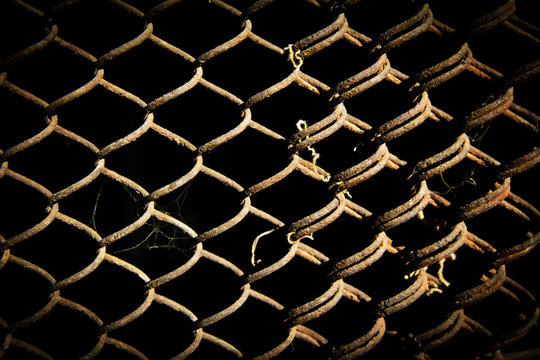 rusty grid on a black background