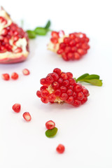 Macro of a Pomegranate section, isolated on white