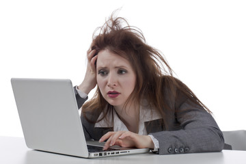 stressed businesswoman with laptop