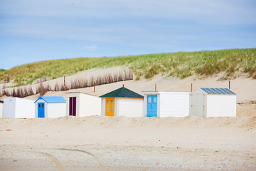 Obraz na płótnie Canvas houses on the beach with blue sky