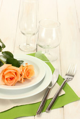 beautiful holiday table setting with flowers