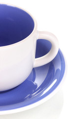 White cup and saucer isolated on white