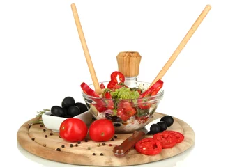 Fotobehang Fresh greek salad in glass bowl surrounded by ingredients for © Africa Studio