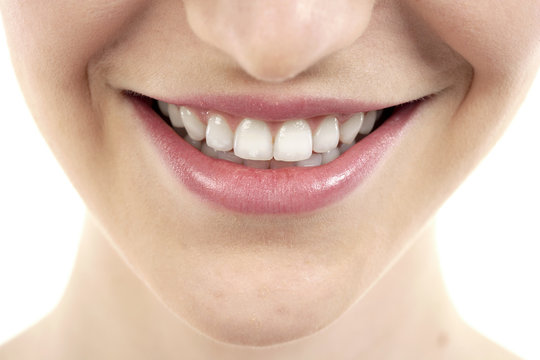 female lips with toothy smile