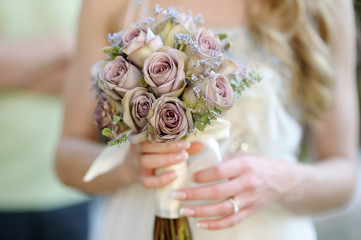 Bride holding a wedding bouquet