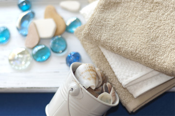 Fototapeta na wymiar Cotton towels and shells