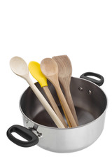 saucepan with wooden spoons