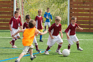 Little Boy playing soccer