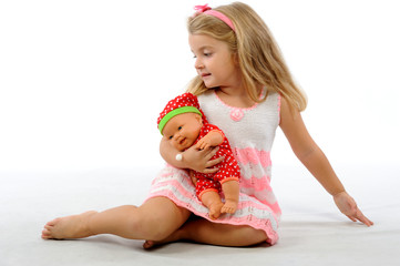 Girl and doll with isolated white bacground