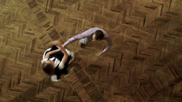Above view of couple training to dance