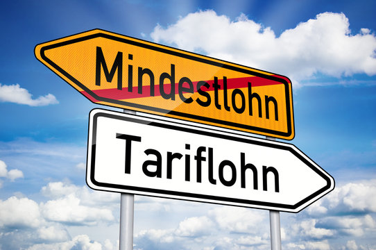 Wegweiser mit Mindestlohn und Tariflohn