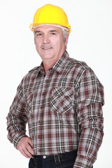 Portrait of man with yellow helmet