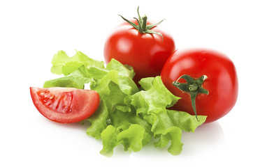 Fresh tomatoes close up on the white