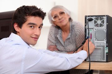 Grandson setting up computer