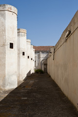 Fototapeta na wymiar Walking in the Jail's courtyard