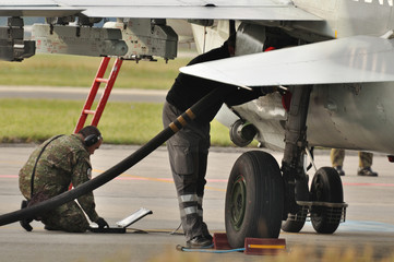 military aircraft ground handling - obrazy, fototapety, plakaty