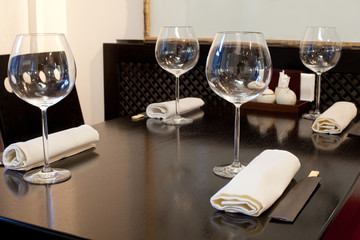Glasses wine on table in sushi restaurant